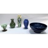 A chameleon ware blue glaze vase, 17 cm; an Art Nouveau style vase; a blue pottery fruit bowl; 3