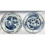 A 19th century Chinese porcelain plate, 23 cm (hairline crack); a 19th century delft plate