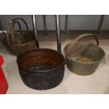 Three 19th century jam pans; an oval pan