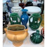 A pair of Art Nouveau 2-handled vases with green glaze, 20 cm; a similar blue glazed baluster