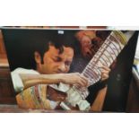 Gunn: man playing a sitar, oil on canvas, signed, 76 x 102cm