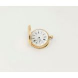 A ladies fob watch in engine turned yellow metal case, stamped '14K', with white enamel dial, 43