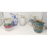 A selection of Victorian decorative pottery jugs; etc.