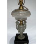 A lamp base, classical design in cast metal and moulded glass, 40 cm (converted to electric light)