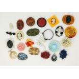 A selection of early / mid 20th century plastic and composition brooches