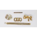 An Art Deco gilt metal brooch; 3 other broches; a chain bracelet