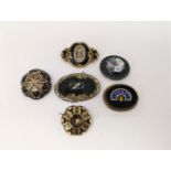 A collection of 6 Victorian mourning brooches