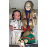 A selection of vintage costume dolls including Inuit in seal skin etc