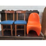 A pair of vintage child's chairs with blue cushions; A mid 20 century style moulded child's chair in