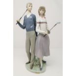 A Lladro porcelain figure group "Jugadores de Golf", 33 cm