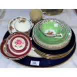 An Elizabeth II commemorative set by Crown Staffordshire, with blue and gilt borders and monogram: