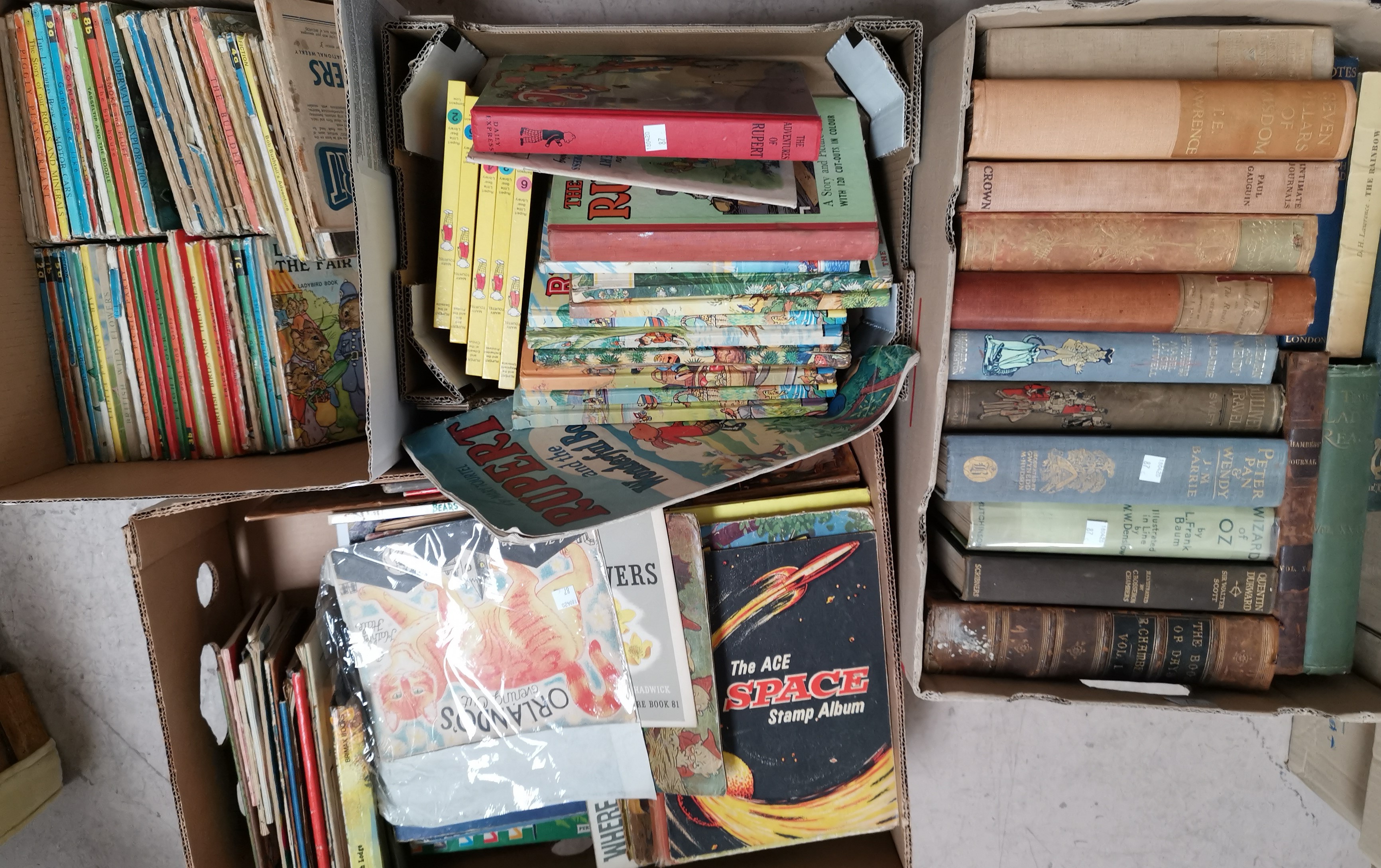 A selection of Rupert books and annuals; a selection of Ladybird books etc