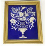 A 19th century blue overlaid glass picture with cut floral decoration, 29 x 24 cm, gilt framed