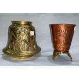 An Art Nouveau brass vase decorated in relief with vases, 13 cm; a copper beaker with brass stand