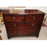 A 19th century mahogany chest of 2 long and 2 short drawers with brass ring handles, on bracket