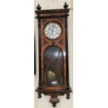 A 19th century Vienna wall clock, 8-day striking twin weight movement, in walnut case with