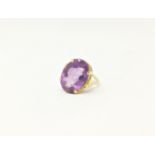 A 1970's dress ring set large oval amethyst, stampede '585', 7.7 gm gross