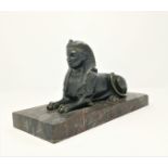 A 19th century patinated bronze figure of a sphinx, variegated brown marble plinth base, 28 cm