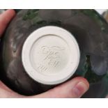 A modern Studio porcelain globular vase with high fired crystalline glaze on green ground,