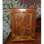 An Edwardian small pine wall cupboard with pokerwork decoration, enclosed by single door, height