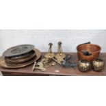 A pair of ship's brass candlesticks, a copper jam pan, brass plaques and other copper and brassware