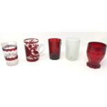 A pair of opaline glass tumblers, 11 cm; a pair in ruby glass; a set of red glass similar; a further