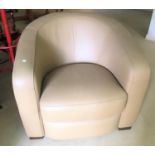 A modern fawn leather tub armchair