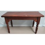 A Victorian mahogany side table on turned reeded legs, length 137 cm