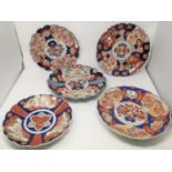 Three late 19th/early 20th century Imari scalloped wall plaques, diameters 30/28/27 cm; Two late