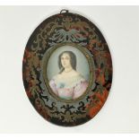 A 19th century miniature half length portrait of a woman, in oval boullework frame, 16.8 x 13 cm
