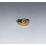 A monogrammed signet ring with internal inscription, unmarked, tests as 18 ct, 5.5 gm