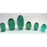 A collection of 6 various Victorian green glass dumpies with bubble/floral inclusions, heights 9-