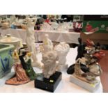 A sculpture of a grotesque figure; 2 classical resin figures; Napoleon on horseback etc