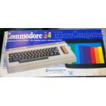 A Commodore 64 computer with accessories