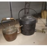 A 19th century copper kettle; a large 19th century cast iron kettle;