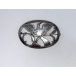 Georg Jensen, an oval Danish silver brooch with stylised Bird Of Paradise with outstretched wings,