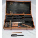 A Chinese testing kit with coloured character stamps, in fitted wooden box