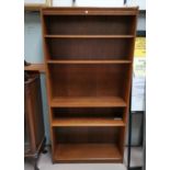 A modern oak full height bookcase