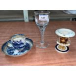 An 18th century style air twist wine; an early 19th century English porcelain coffee cup and