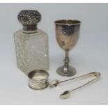 A hall marked silver goblet with etched presentation decoration London 1923 and cut glass scent