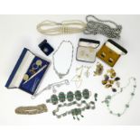 Two 9 carat hallmarked gold cross pendants, one with chain; an Art Nouveau gem set pendant,