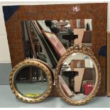 A large mirror in mosaic frame; 2 other mirrors