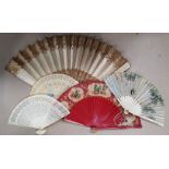 A silk and lace fan with white and gilt lacquered sticks; 4 other fans