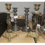 A pair of 19th century pewter candlesticks, 21cm; a pair of brass figural candlesticks, 24cm