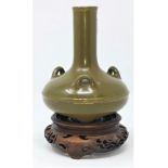 A Chinese bronze gilded tea dust vase with impressed mark to base, on wooden stand height 14.5cm