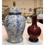 A Chinese large covered baluster vase, crackle glaze decorated in blue and white with birds in