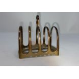 A hallmarked silver toast rack, Sheffield 1905, 2.2oz by James Deakin & sons