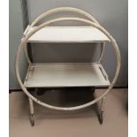 An Art Deco tubular metal 2 tier trolley in later white painted finish
