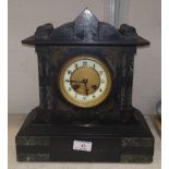 A marble and slate cased mantel clock with brass dial