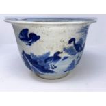 A Chinese blue and white jardiniere with flared rim, decorated with birds, diameter 26.5cm